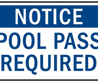 An image of a notice sign that reads 'Pool Pass Required,' emphasizing the need for pool pass software management. This visual highlights the importance of organized pool pass verification to ensure smooth operations.